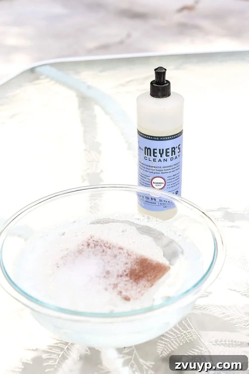 Achieve a Streak-Free Shine on Your Patio Glass Table 5 How to Revive a Glass Patio Table | blesserhouse.com - A tutorial explaining how to clean, paint, and revive a glass patio table to make it look brand new in a few quick steps.