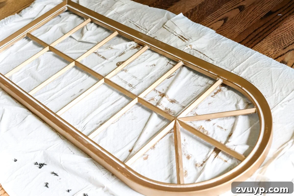 DIY Faux Aged Gold Antique Mirror Makeover 5 DIY Aged Gold Antique Mirror Makeover | Learn how to apply Rub 'n Buff to a mirror frame for an aged gold finish.