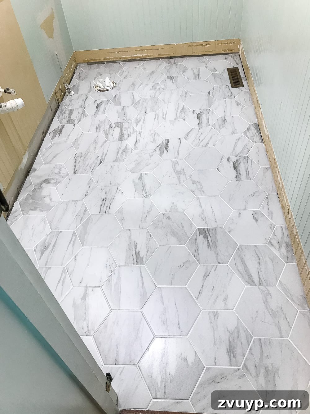 Powder Room Glow-Up: The Faux Marble Tile Floor Reveal 7 The Best Faux Marble Tile | blesserhouse.com - A dated powder room floor gets a modern classic refresh with faux marble tile & why hiring a contractor is sometimes cheaper than DIY.