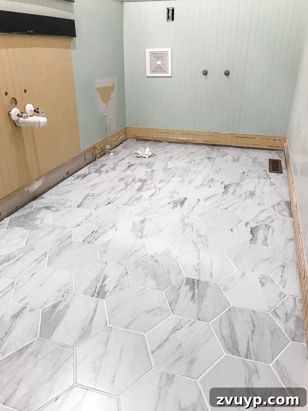 Powder Room Glow-Up: The Faux Marble Tile Floor Reveal 10 The Best Faux Marble Tile | blesserhouse.com - A dated powder room floor gets a modern classic refresh with faux marble tile & why hiring a contractor is sometimes cheaper than DIY.