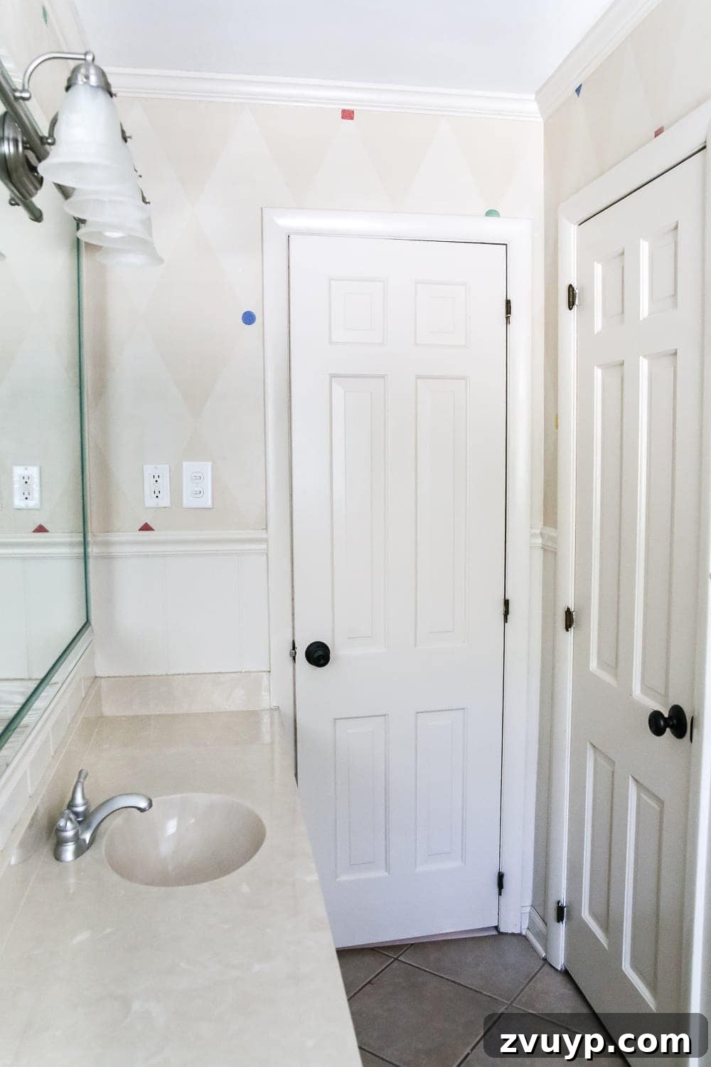 Serene Teal Bathroom Transformation 6 Comparative image of the bathroom before and after the teal paint makeover.