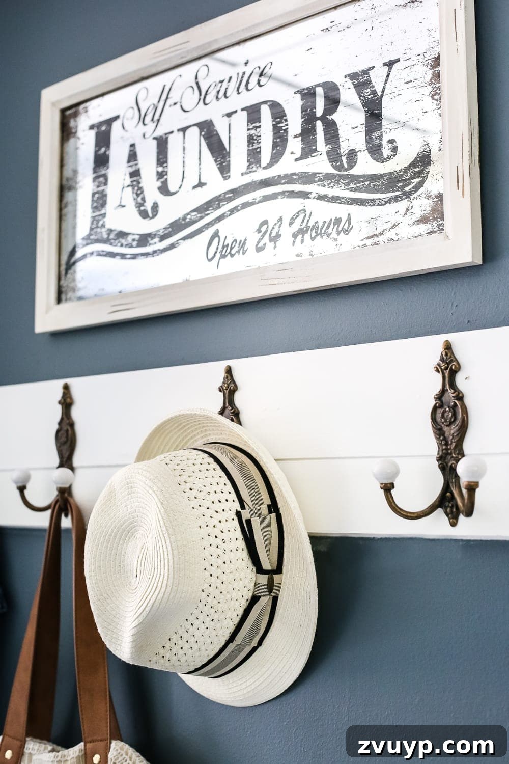 7 Brilliant Laundry Room Organizing Hacks 3 Efficient Laundry Room Organization: Hooks for Coats and Bags in a Drop Zone