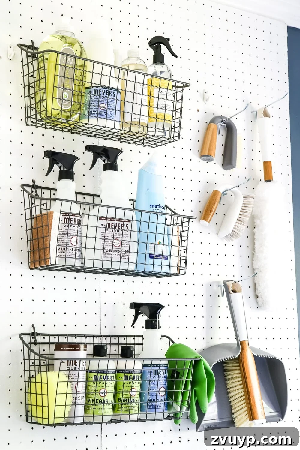 7 Brilliant Laundry Room Organizing Hacks 5 Vertical Storage with Pegboard for Organized Cleaning Supplies