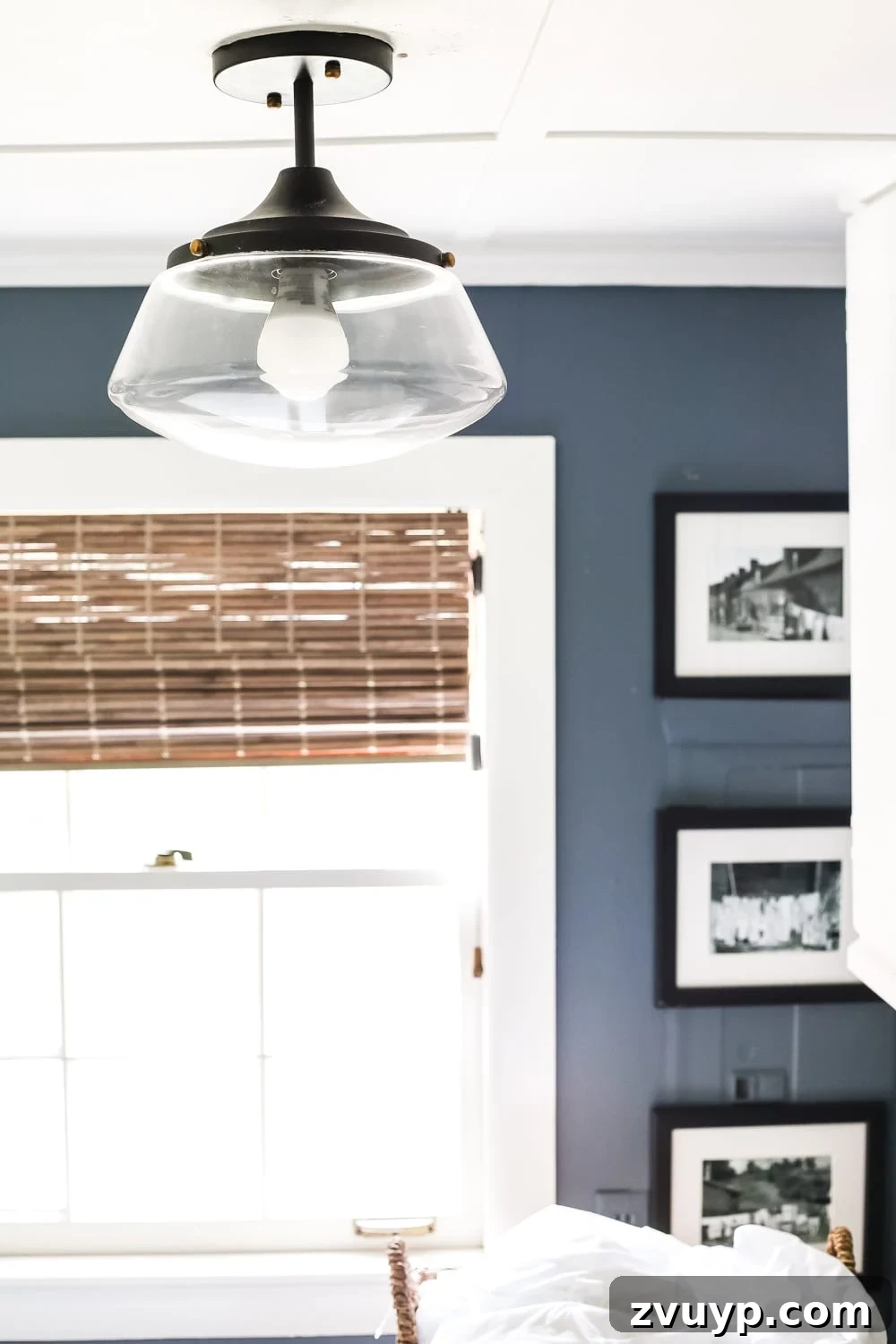 High Contrast Laundry Room: A Bold Statement Unveiled 11 High Contrast Laundry Room Makeover | blesserhouse.com - A dingy and dated laundry room gets a high contrast navy and white makeover packed with organizational strategies and budget-conscious DIY projects.