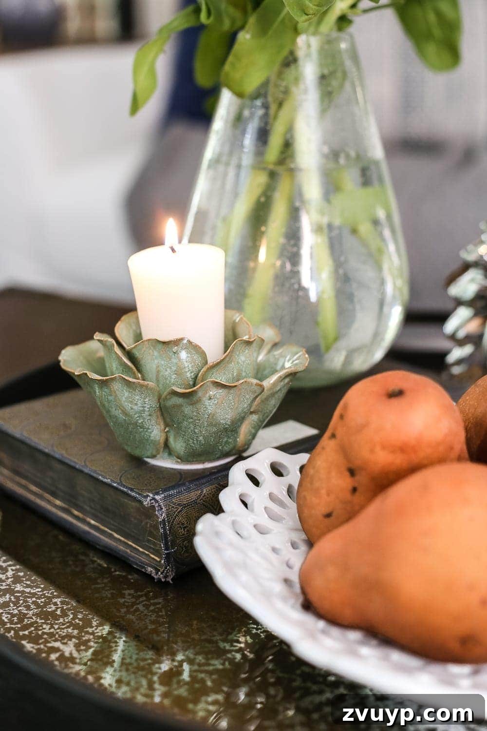 Making Your Home Look Expensive Without Breaking the Bank 13 Cozy Living Room with Blossom Tealight Holder on Coffee Table