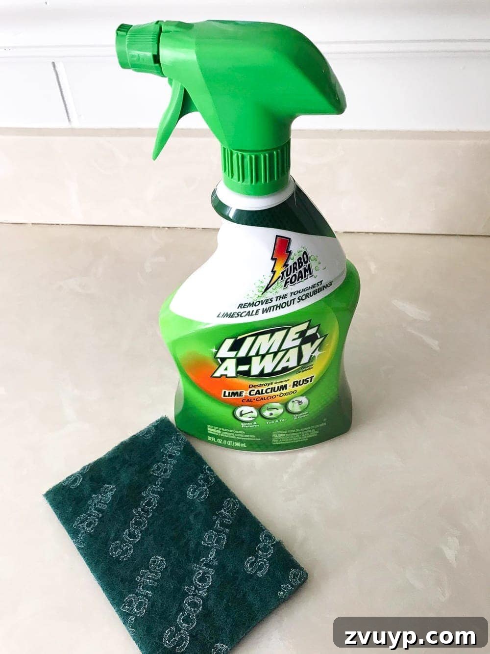Painted Bathroom Countertop Revival 11 Applying Lime-a-way cleaner before painting the countertop
