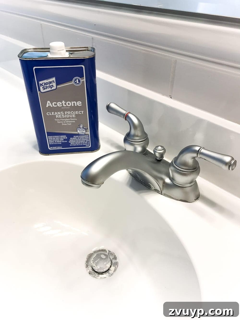 Painted Bathroom Countertop Revival 19 Using acetone to clean up epoxy paint drips on faucet