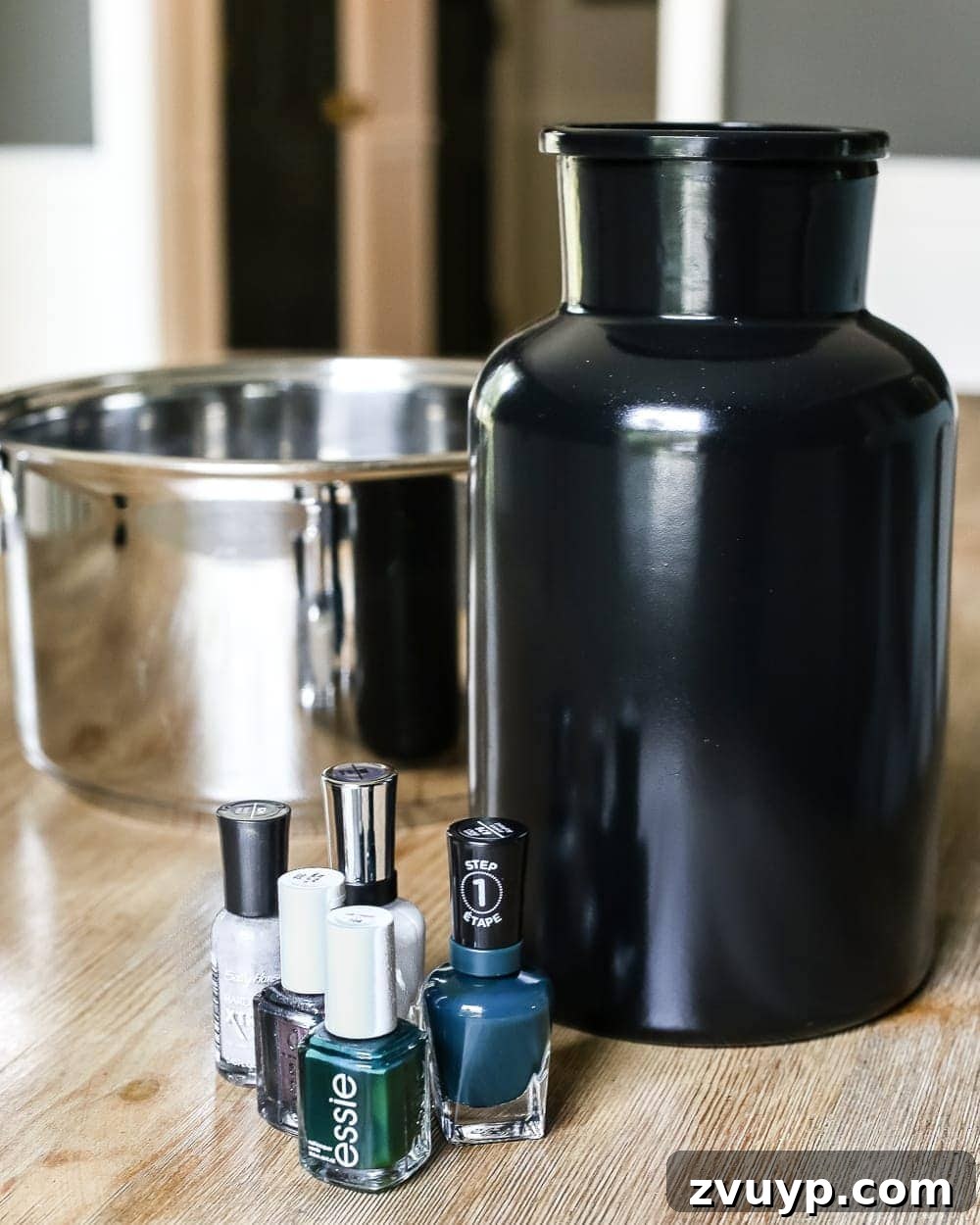 Marbled Wonders for a Haunted Welcome 5 Applying black spray paint to glass jars for marbling