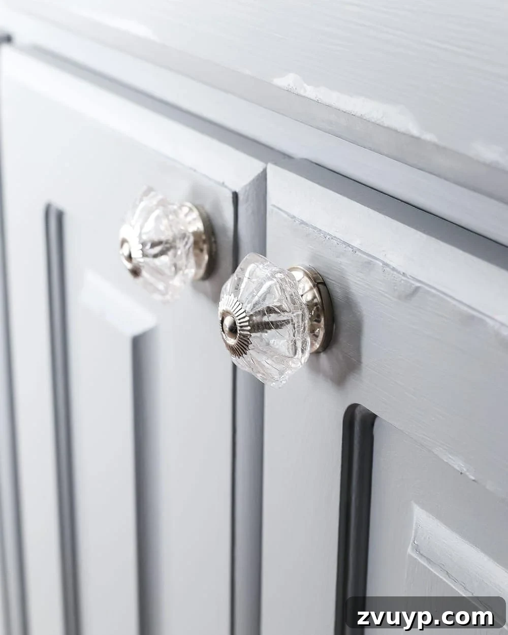 Elevate Your Bathroom with a Cabinet Paint Refresh 6 New glass knobs and pulls on painted bathroom vanity. Hardware update for bathroom cabinets.