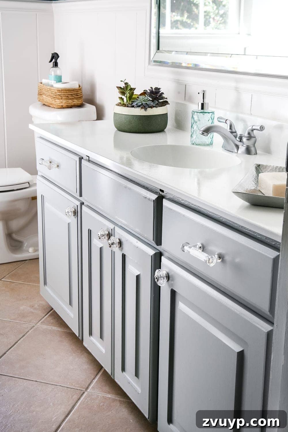 Elevate Your Bathroom with a Cabinet Paint Refresh 8 Painted bathroom sink and countertop holding up well after DIY project. Inexpensive bathroom update.