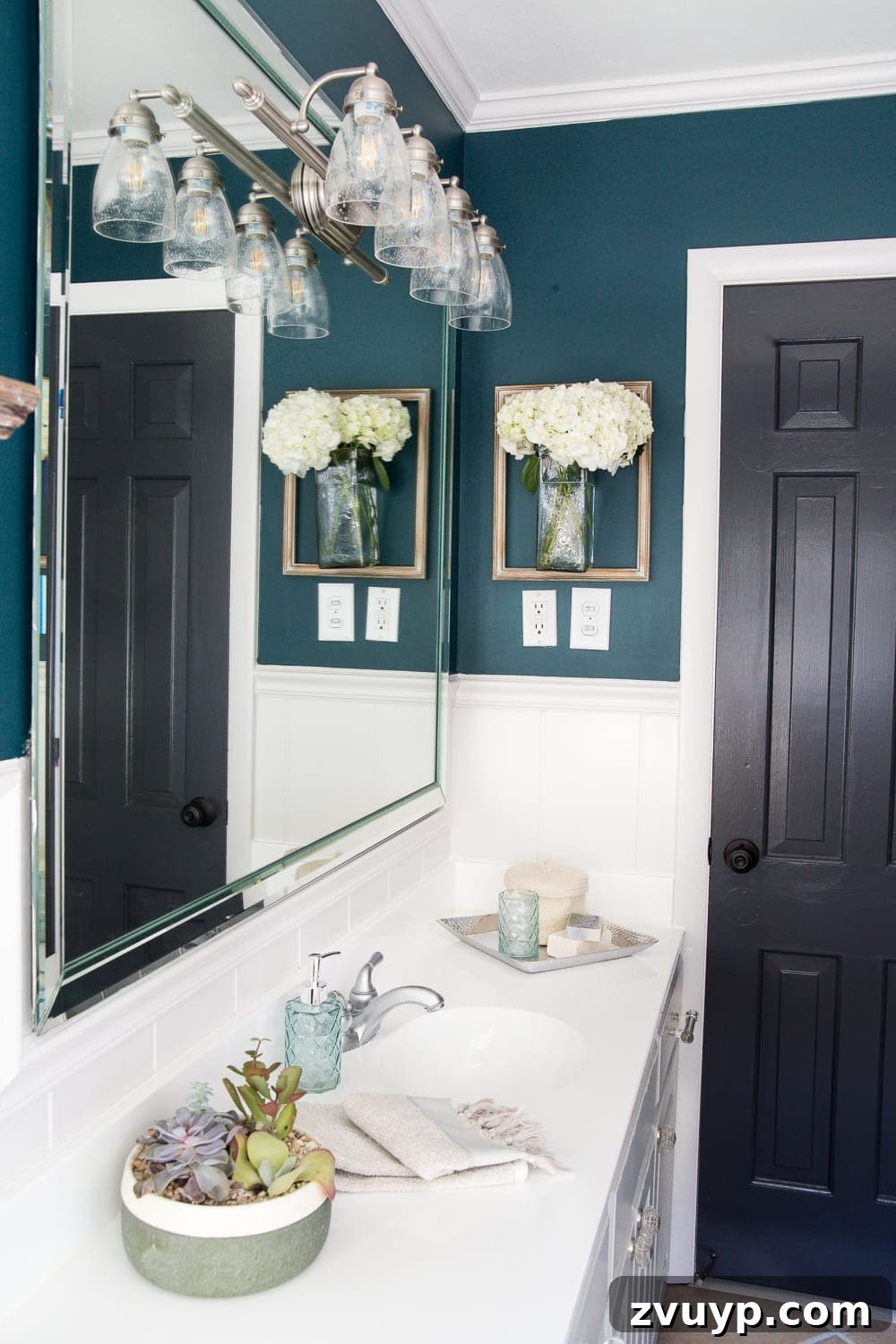 Kid Friendly and Guest Ready Bathroom Makeover 19 Tassel Shower Curtain in Teal Bathroom: A charming DIY tassel shower curtain adds whimsical elegance and texture to the refreshed bathroom. #tasselcurtain #diydecor #showercurtain