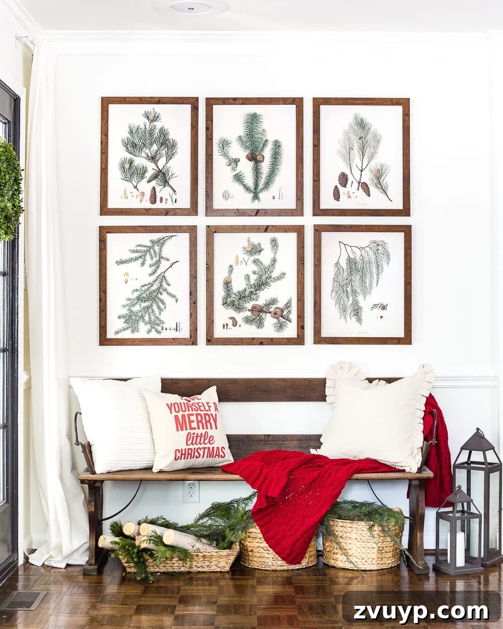 Snow-Kissed Botanical Gallery Prints 8 Cozy Christmas Entryway with Faux Greenery and Lanterns