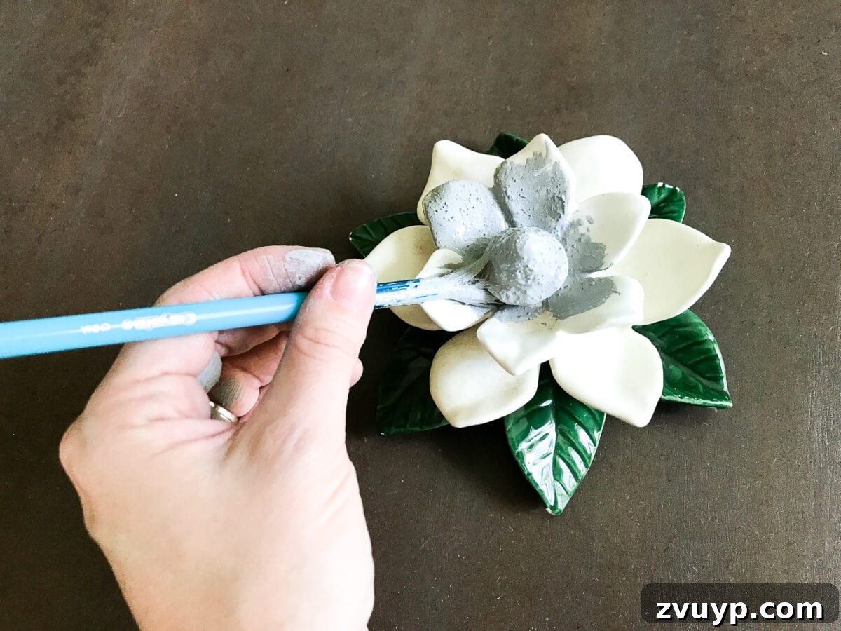 A quick and simple tutorial for how to make anything look like concrete with craft paint. #crafting #painting #thriftydecor 