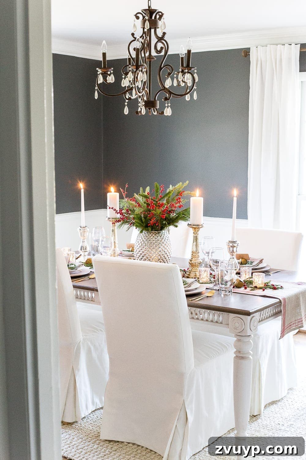 Mercury Glass Magic: A Christmas Tablescape 12 Mercury Glass Christmas Tablescape | blesserhouse.com - How to set up a vintage glam mercury glass Christmas tablescape with tips and sources for how to do it on a budget. #christmasdecor #christmastablescape #holidaydecor #christmasdiningroom
