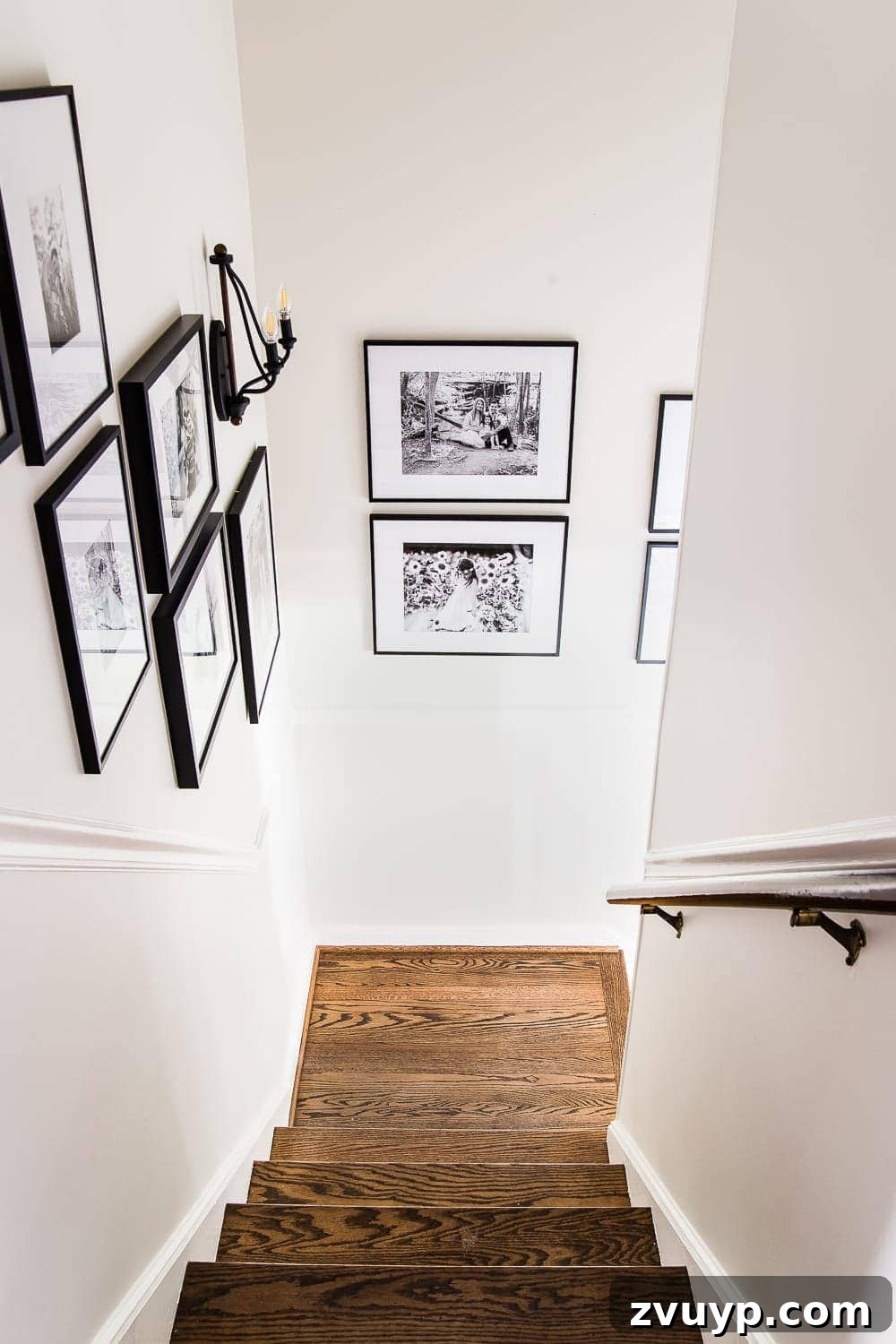 Flawless Gallery Walls Made Simple 15 staircase gallery wall with black frames