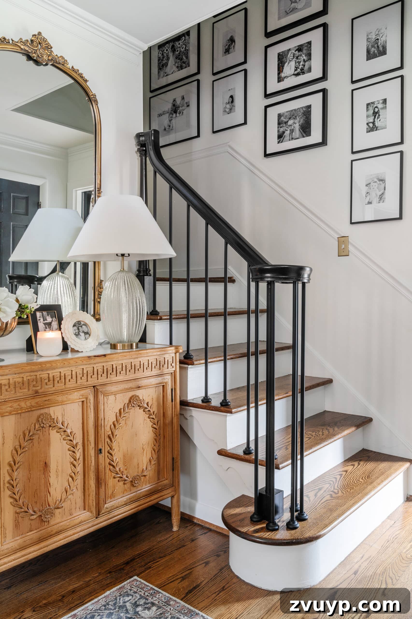 Flawless Gallery Walls Made Simple 21 staircase gallery wall with black and white family photos