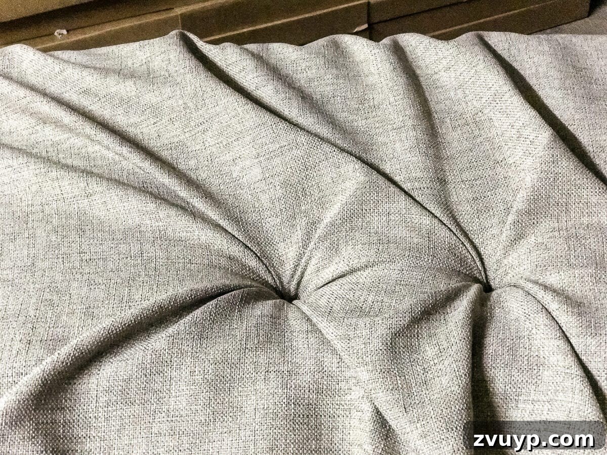 From Coffee Table to Ottoman An Easy DIY Transformation 23 Pulling Fabric for Next Tuft, Avoiding Puckers