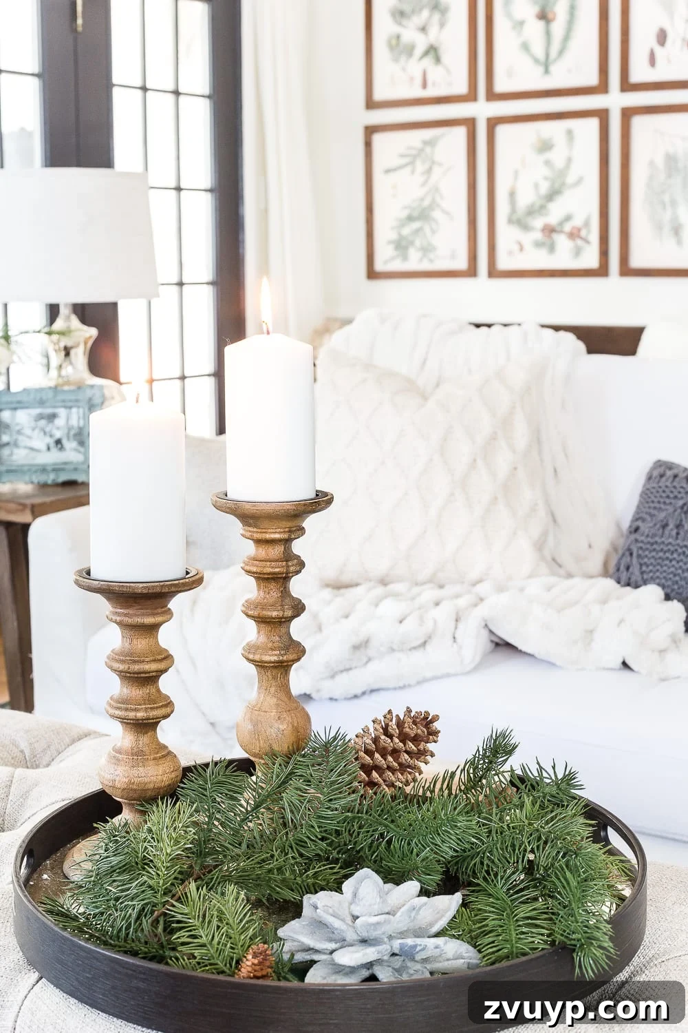 Creating a Cozy Winter Home After Christmas 5 Simple winter greenery arrangement in a neutral setting, adding a touch of nature after Christmas.