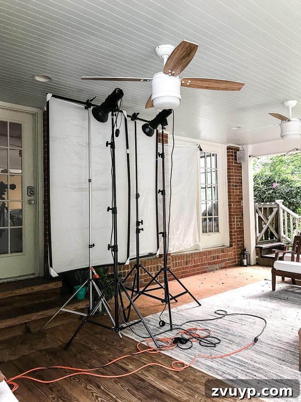 Curating Dream Homes for Publication 3 Professional photography setup on a home's back porch for a Better Homes and Gardens photoshoot