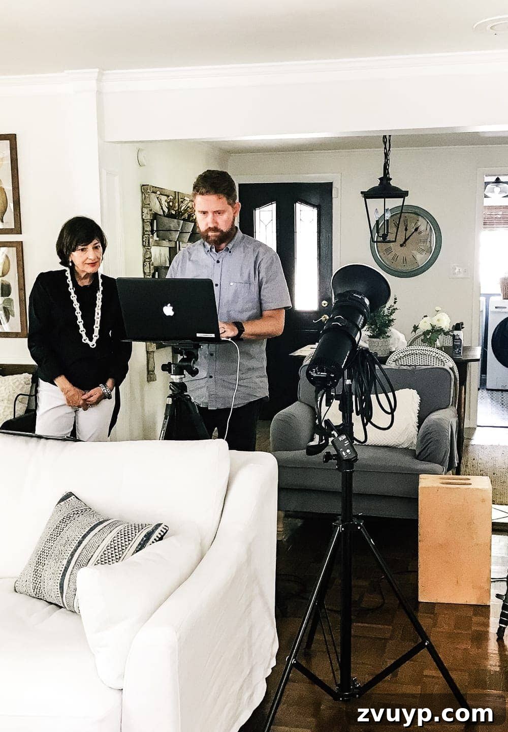 Curating Dream Homes for Publication 4 Better Homes and Gardens photoshoot crew, including the stylist and photographer, working on set
