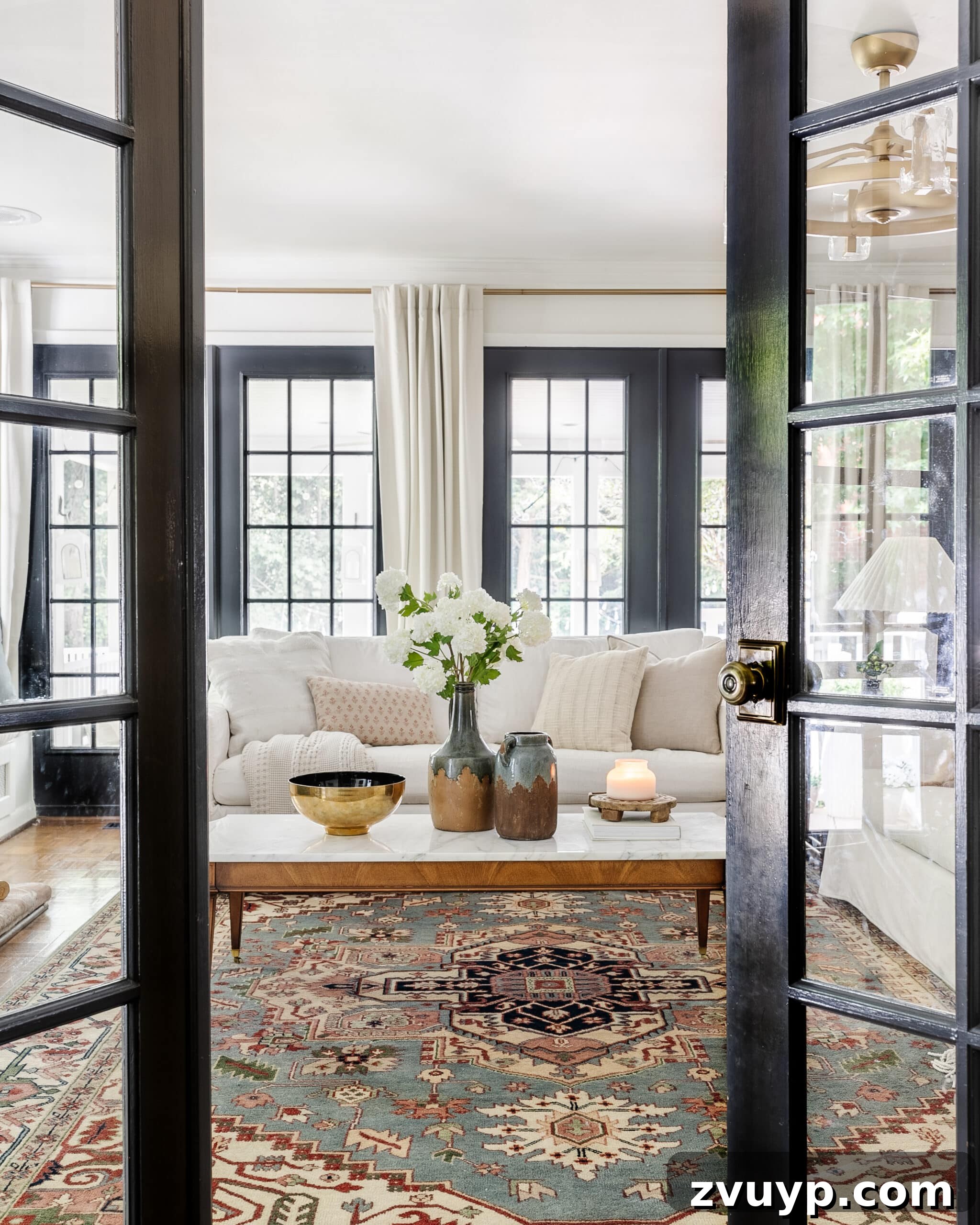 DIY French Door Painting Tips and Replacement Cost Breakdown 3 wall of french doors in living room