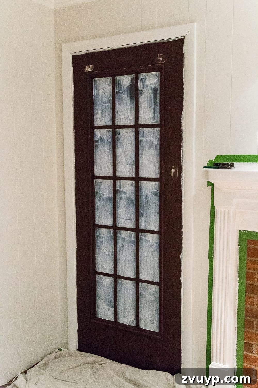 DIY French Door Painting Tips and Replacement Cost Breakdown 10 freshly applied masking liquid on a french door