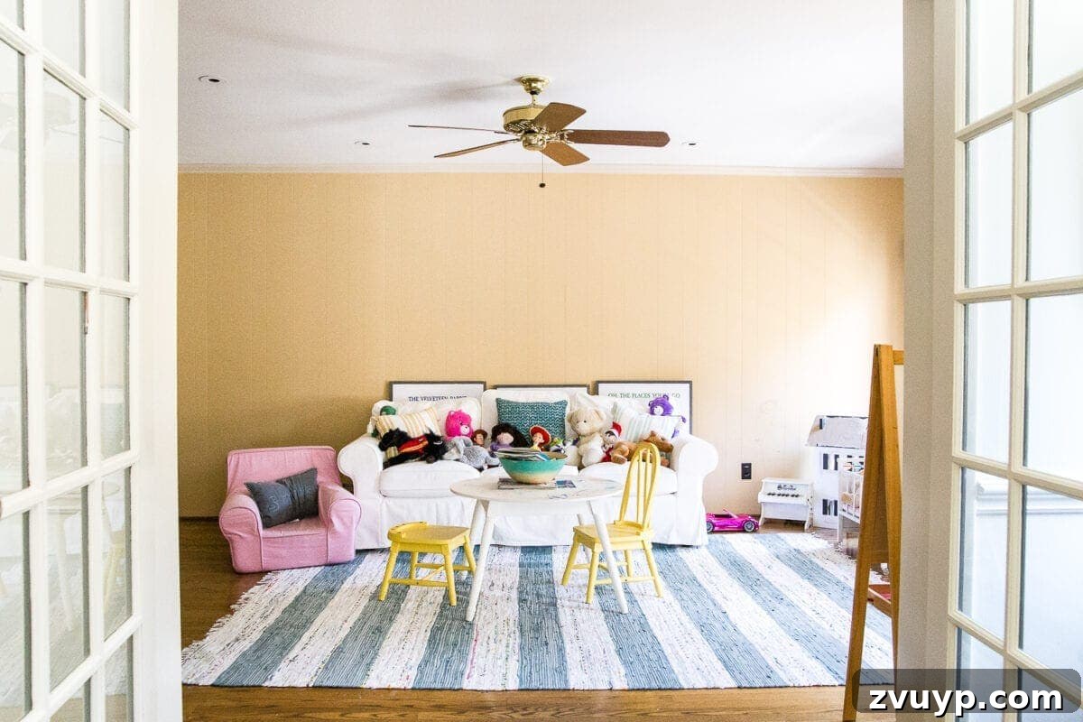 DIY Dream Playroom: Seamless Built-In Bookshelves 2 An easy to follow step-by-step tutorial showing how to build bookcase built-ins using IKEA Billy bookcases. #IKEAhack #homeimprovement #build #playroom Playroom before