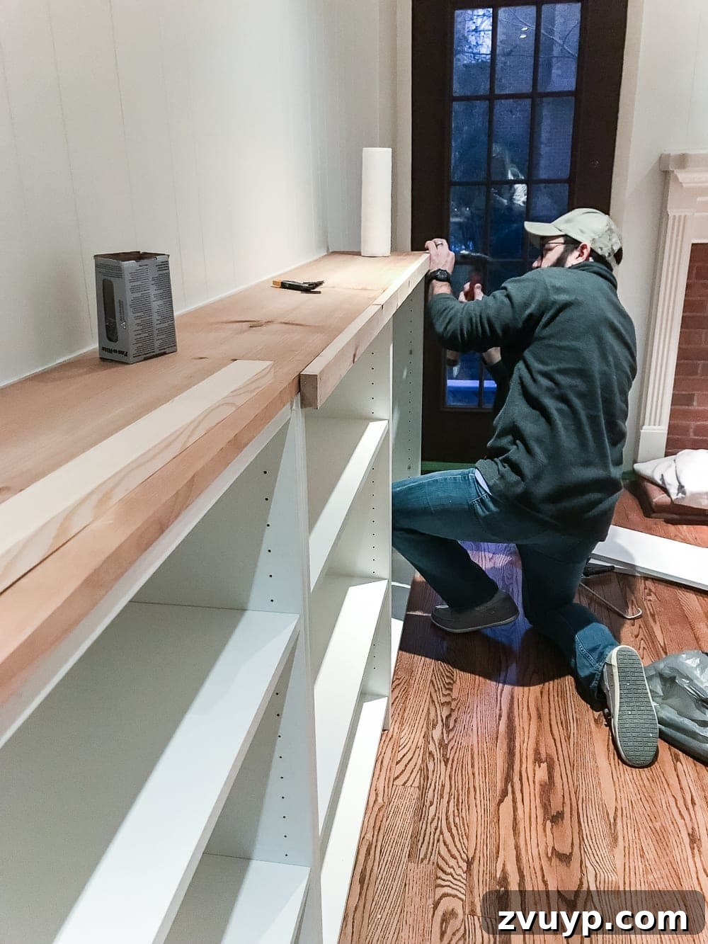 DIY Dream Playroom: Seamless Built-In Bookshelves 13 An easy to follow step-by-step tutorial showing how to build bookcase built-ins using IKEA Billy bookcases. #IKEAhack #homeimprovement #build #playroom