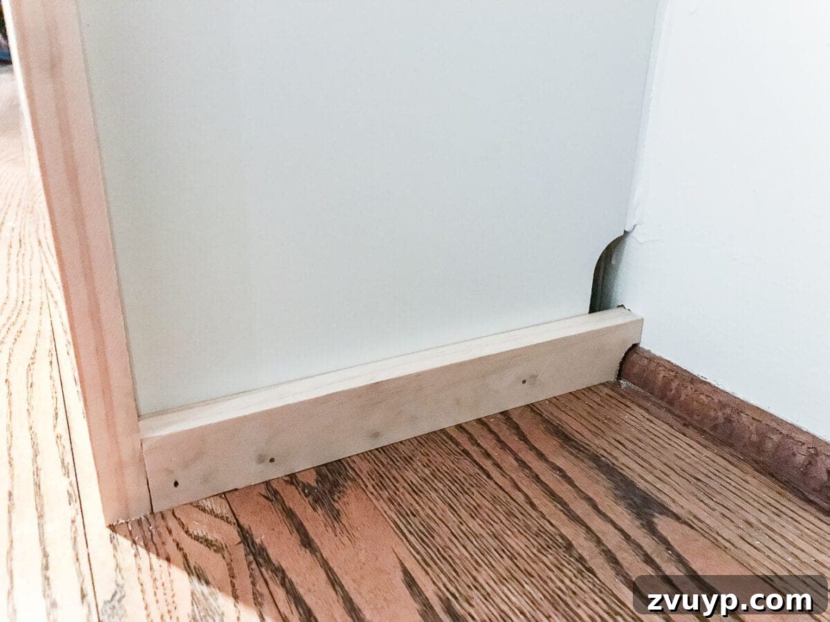 DIY Dream Playroom: Seamless Built-In Bookshelves 17 An easy to follow step-by-step tutorial showing how to build bookcase built-ins using IKEA Billy bookcases. #IKEAhack #homeimprovement #build #playroom