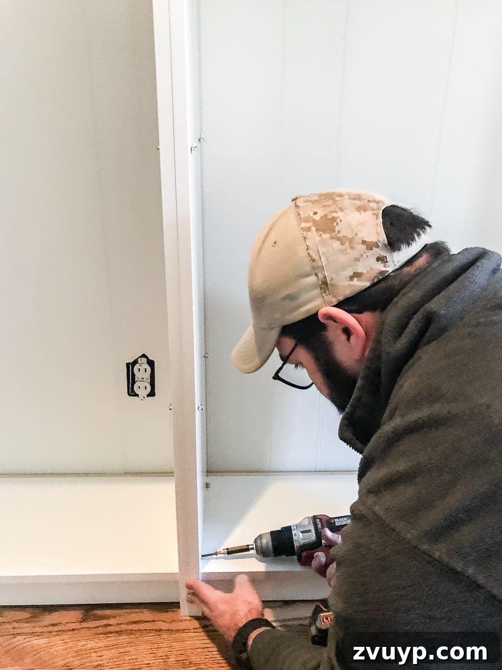 DIY Dream Playroom: Seamless Built-In Bookshelves 7 An easy to follow step-by-step tutorial showing how to build bookcase built-ins using IKEA Billy bookcases. #IKEAhack #homeimprovement #build #playroom