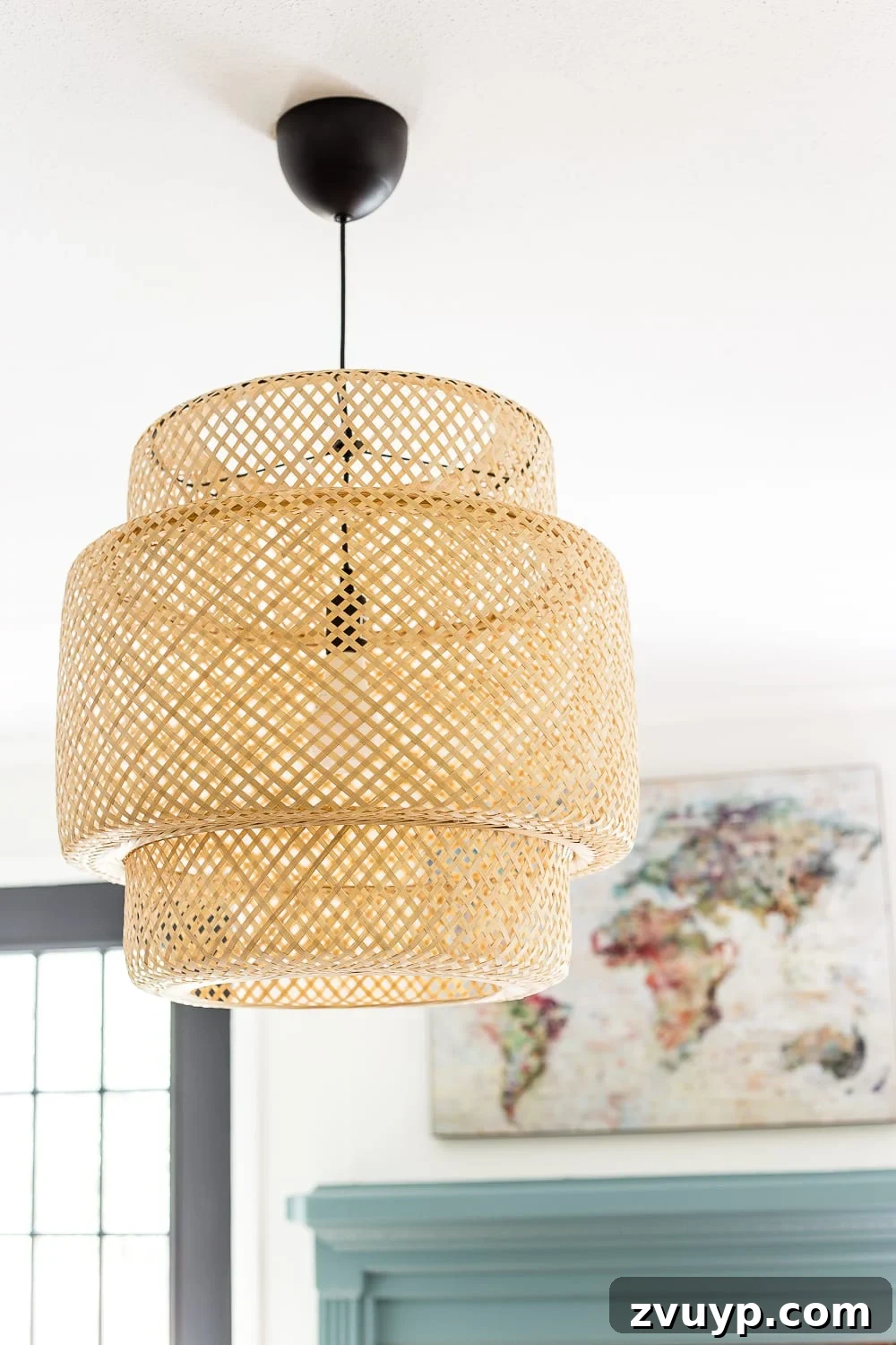 Playroom Glow Up: Fresh Lights and Furnishings 5 A close-up of a stylish bamboo light fixture, providing ambient lighting in a modern playroom with organized storage.