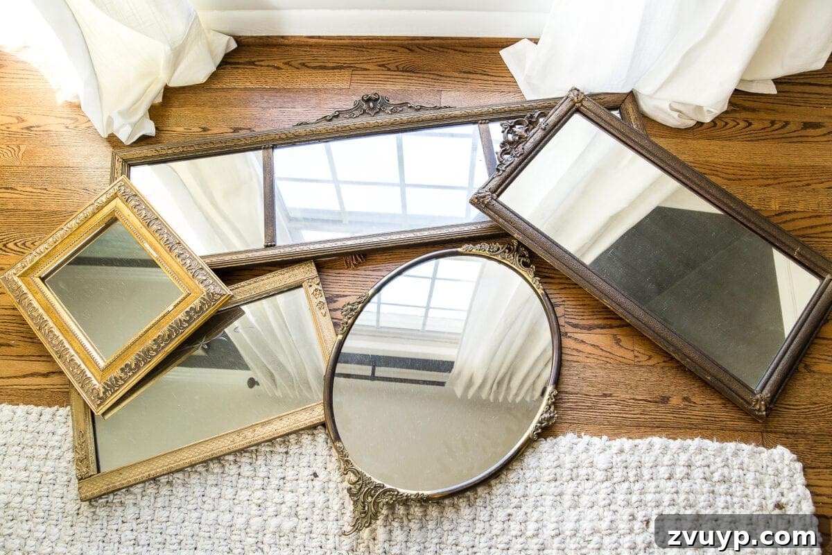 Thrifted Frames, Sparkling Reflections Gallery 2 A couple of tricks for hanging the perfect mirror gallery wall plus ideas for a traditional meets modern eclectic dining room. #diningroom #gallerywall #walldecor #mirrors