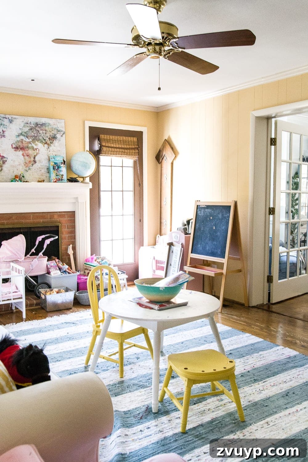 Kids Dream Playroom Revealed 7 Playroom before organization, showing a cluttered corner with toys, illustrating the need for toy organization.