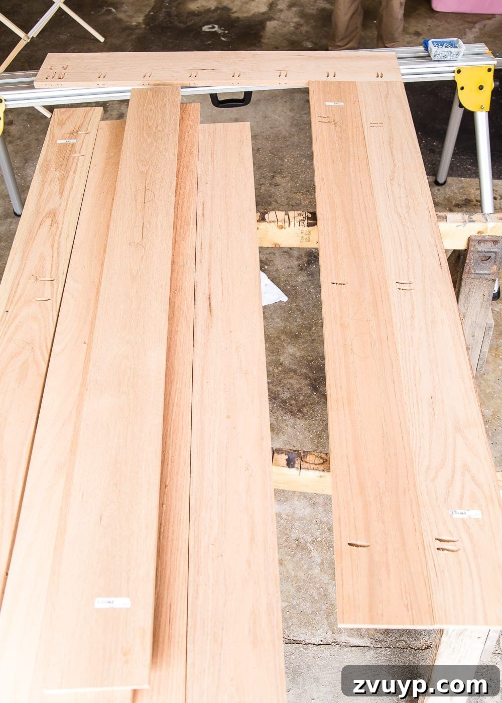 Revamping Your Dining Table Top 11 A tutorial for how to build a retrofitted table top to fit over any existing table using Minwax Dark Walnut stain. #build #furniturebuilding #tabletop #diningtable #diytable #farmhousetable #diyfurniture #woodworking #furnituremakeover #tablemakeover #minwax #woodstain #walnut