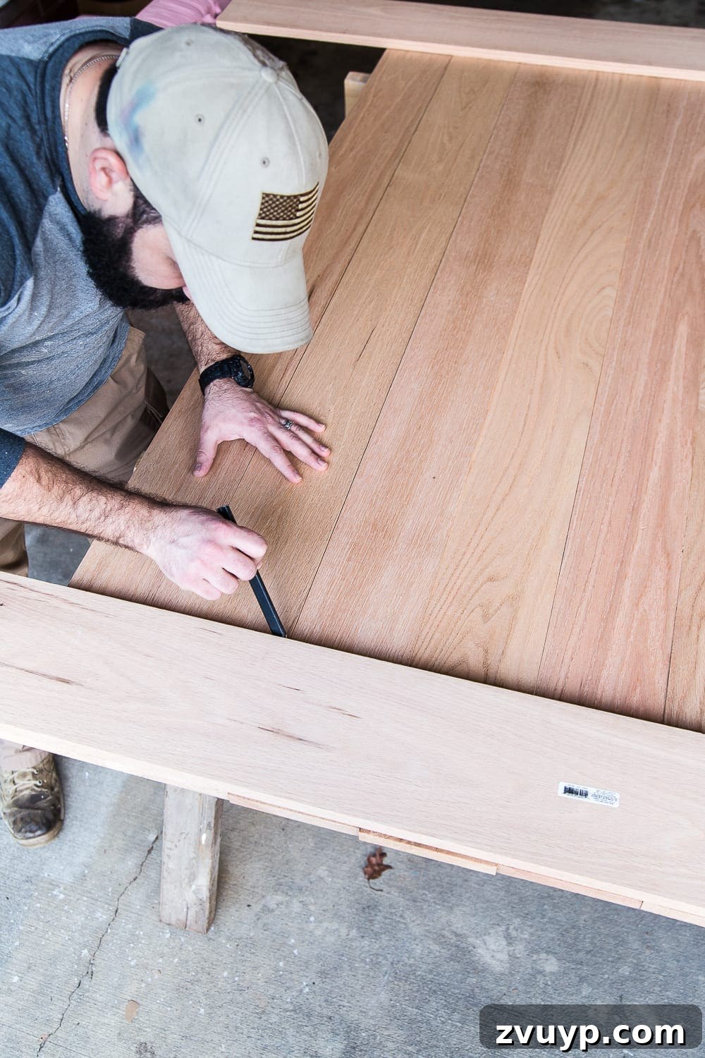 Revamping Your Dining Table Top 7 A tutorial for how to build a retrofitted table top to fit over any existing table using Minwax Dark Walnut stain. #build #furniturebuilding #tabletop #diningtable #diytable #farmhousetable #diyfurniture #woodworking #furnituremakeover #tablemakeover #minwax #woodstain #walnut