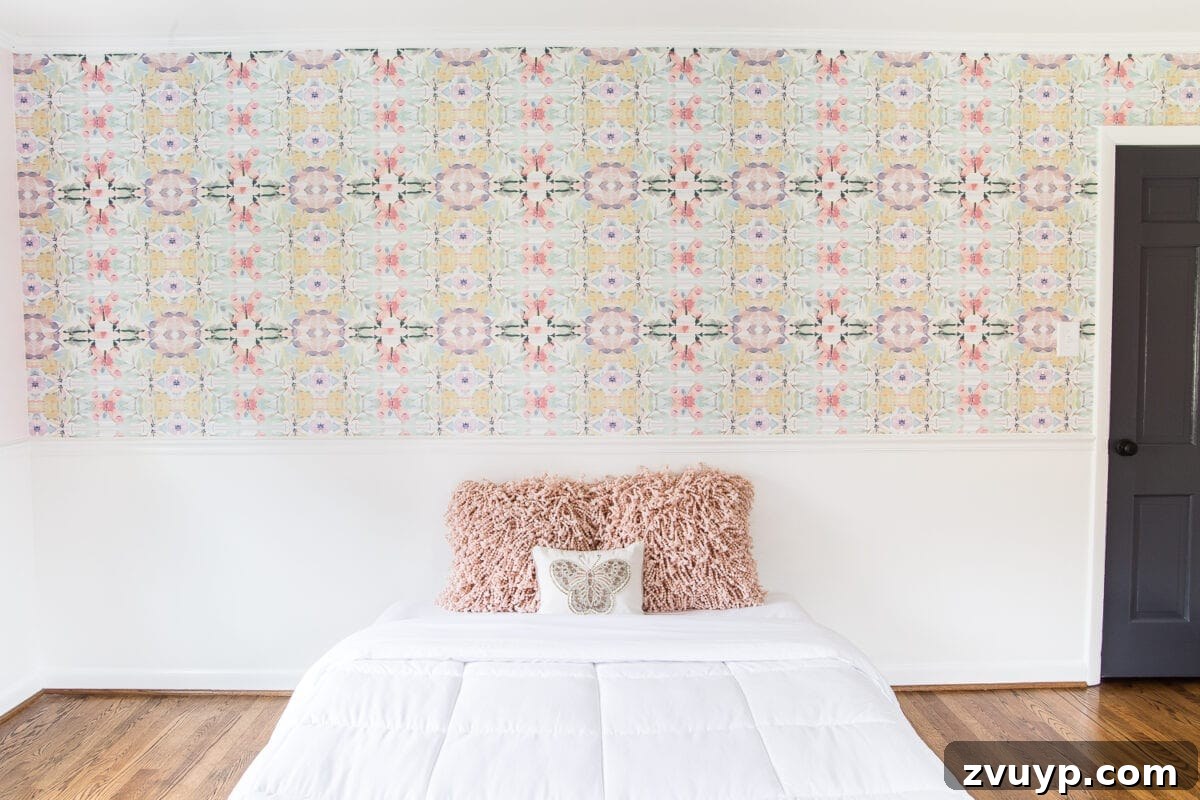 A Magical Makeover: New Wallpaper for Her Bedroom 4 A sweet pastel little girl bedroom makeover with Behr My Sweetheart and retro wallpaper to transition into pre-teen/teenage years. #girlbedroom #kidsdecor #wallpaper #pinkpaint