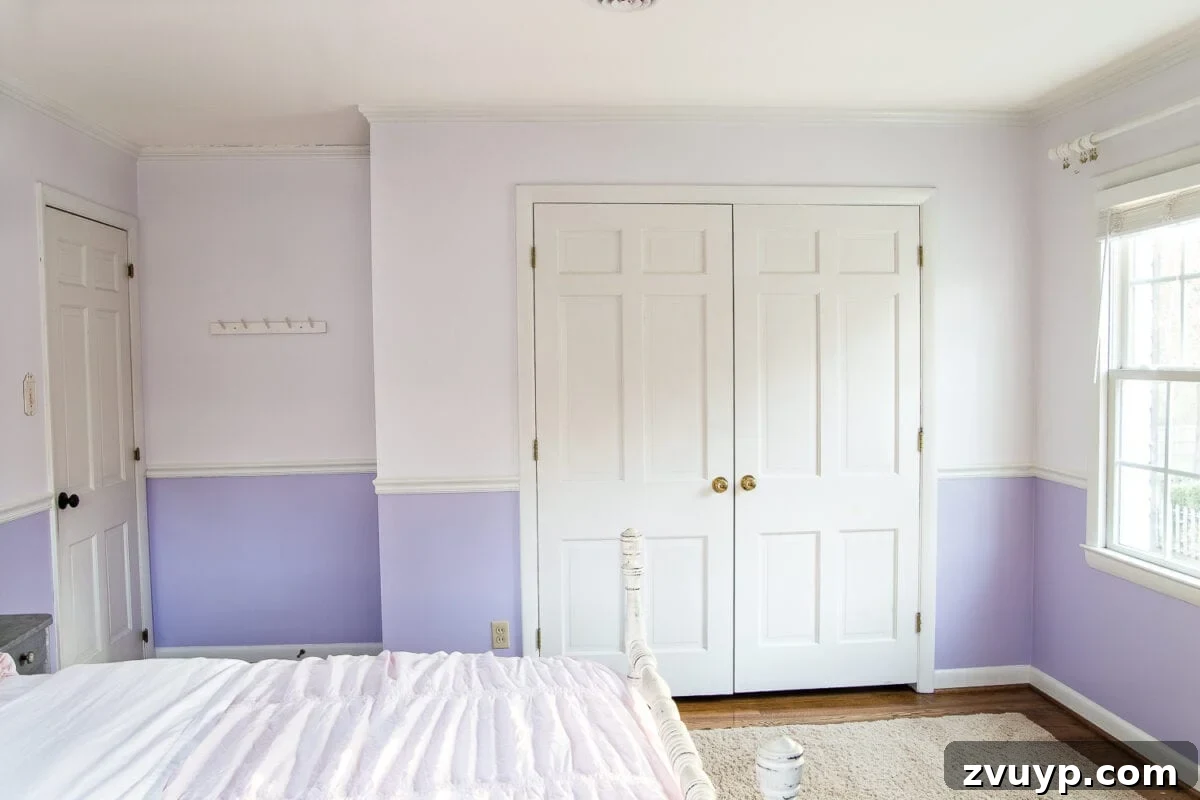 A Magical Makeover: New Wallpaper for Her Bedroom 5 A sweet pastel little girl bedroom makeover with Behr My Sweetheart and retro wallpaper to transition into pre-teen/teenage years. #girlbedroom #kidsdecor #wallpaper #pinkpaint