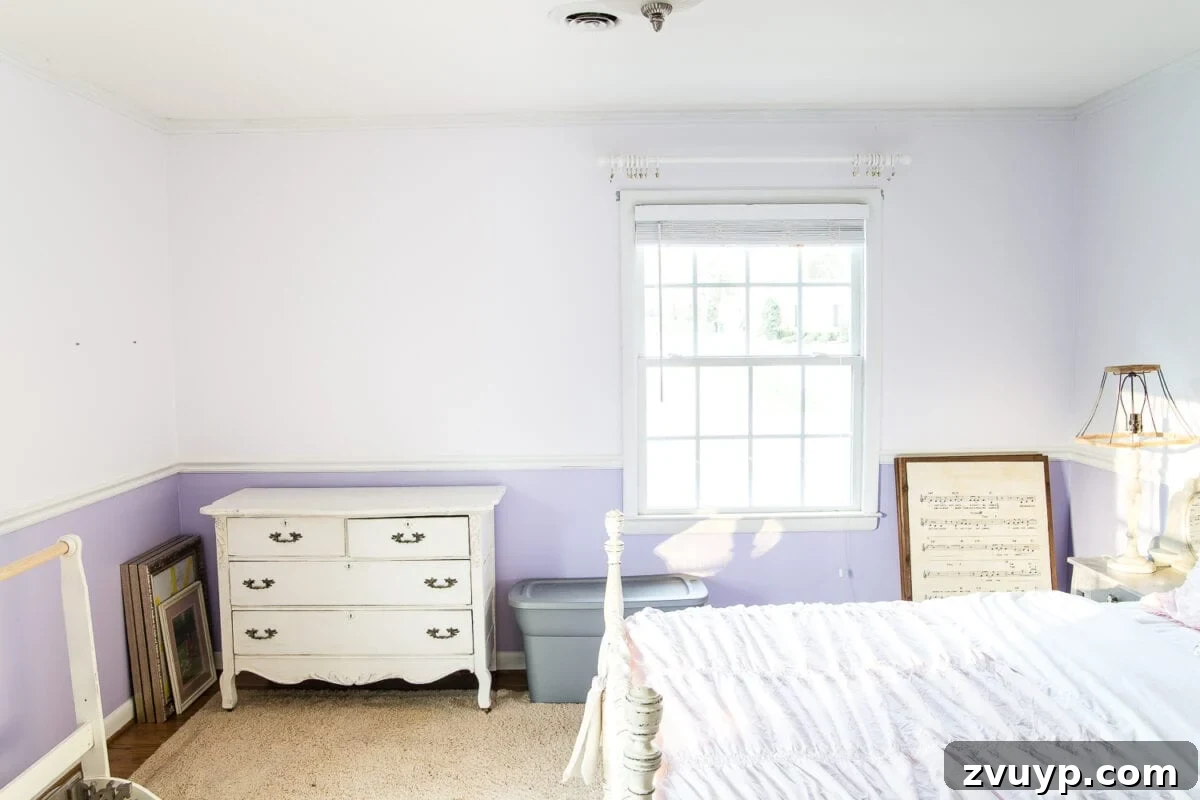 A Magical Makeover: New Wallpaper for Her Bedroom 7 A sweet pastel little girl bedroom makeover with Behr My Sweetheart and retro wallpaper to transition into pre-teen/teenage years. #girlbedroom #kidsdecor #wallpaper #pinkpaint