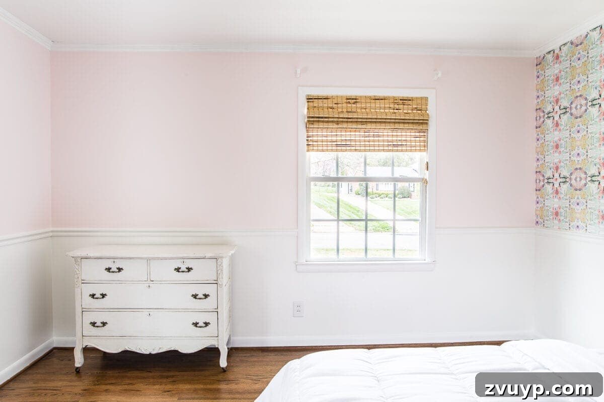 A Magical Makeover: New Wallpaper for Her Bedroom 8 A sweet pastel little girl bedroom makeover with Behr My Sweetheart and retro wallpaper to transition into pre-teen/teenage years. #girlbedroom #kidsdecor #wallpaper #pinkpaint
