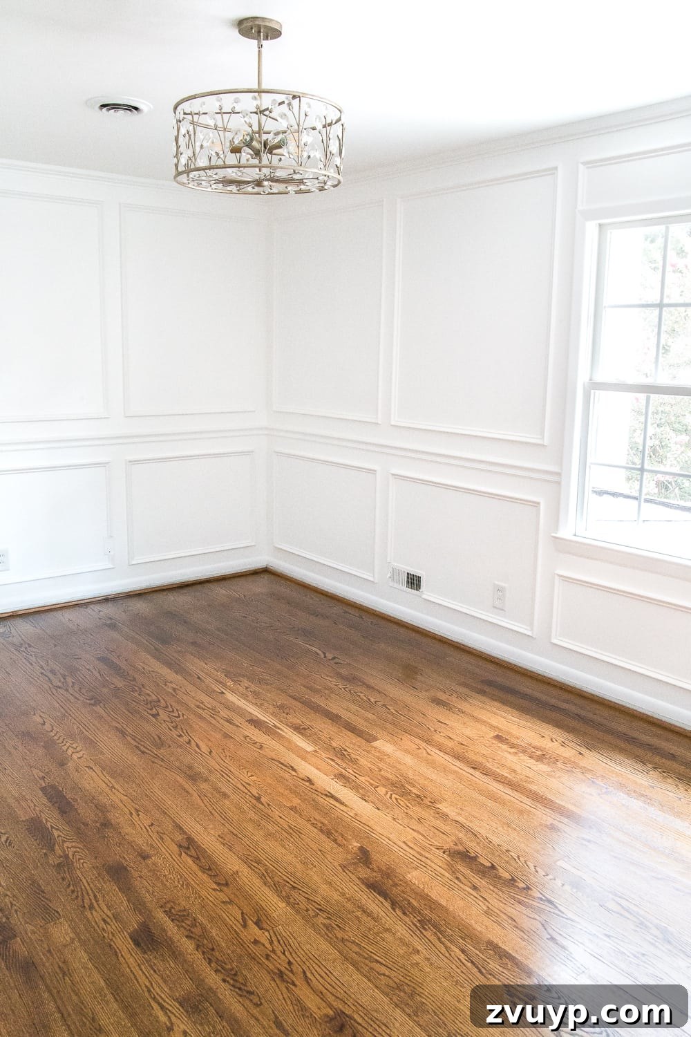 Ageless Interior Design: Lasting Style Principles 20 Medium brown hardwood floors providing a classic interior design look, enhancing the timeless elegance of the space.