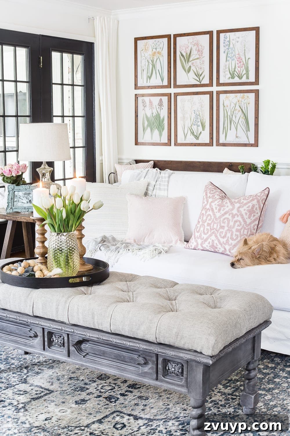 Spring Living Room Refresh 3 A living room gets a spring refresh with simple florals, candle light, and light fabrics. #springdecor #livingroom #springlivingroom #springaccents #livingroomdesign #livingroomdecor #budgetdecor