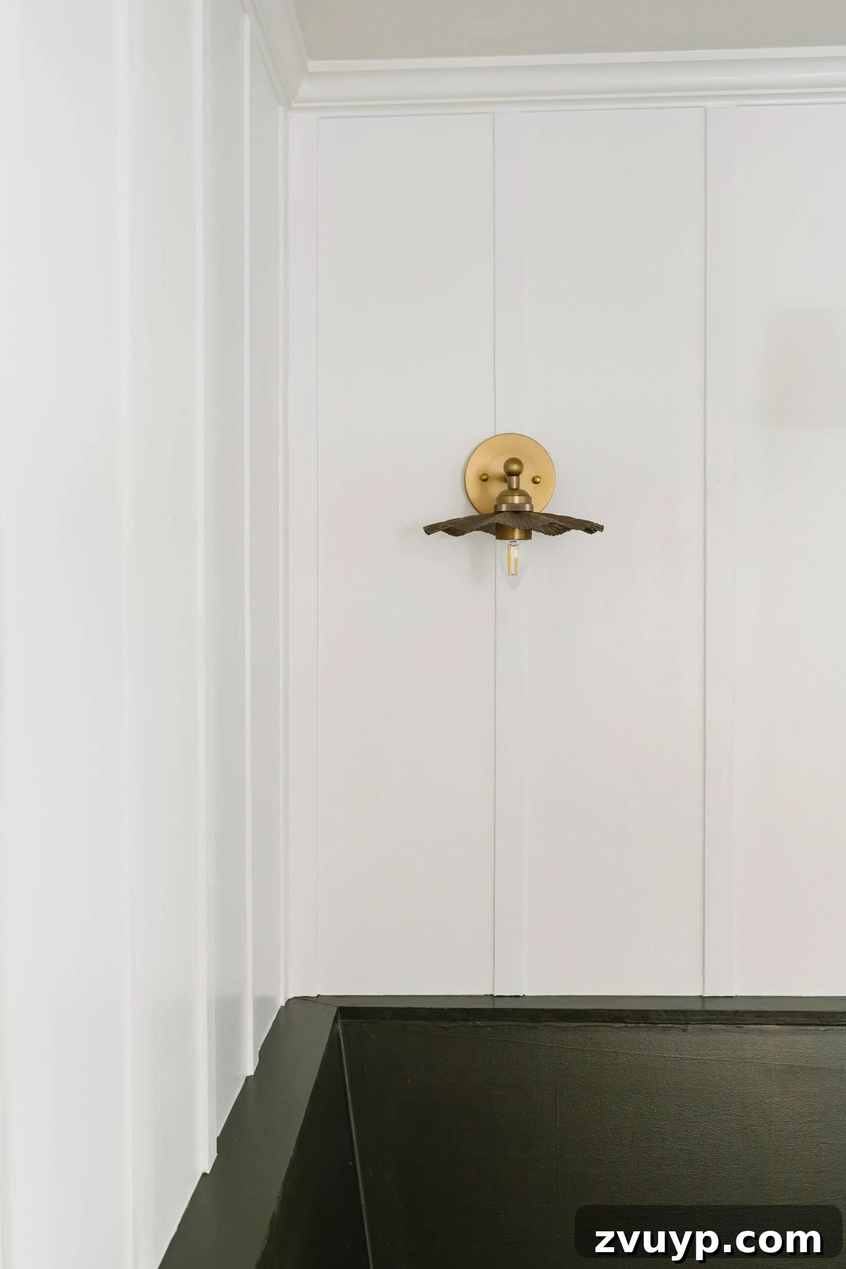 Vintage Wall Sconces: Timeless Designs for Every Budget & Every Space 6 ruffled flower vintage brass wall lights on a board and batten wall