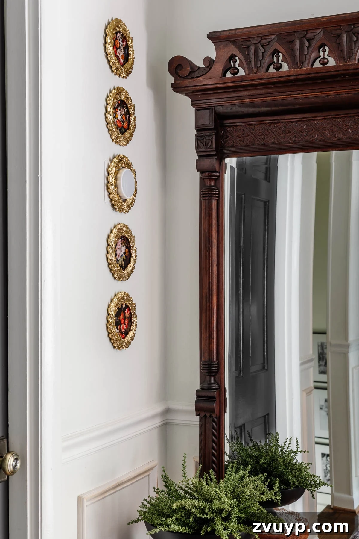 Mastering Thermostat Disguise Without Impacting Its Efficiency 3 Creative gallery wall incorporating a thermostat, featuring an ornate gold frame around the thermostat itself, blending functionality with decorative art.