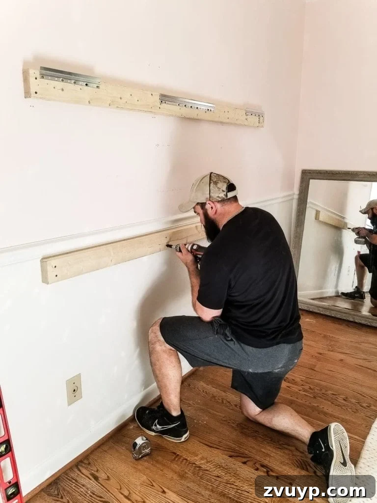 DIY Barre & Chair Rail Decor: Elevate Your Space and Practice 4 How to make a ballet barre with mirrors and shelf brackets and how to hang wall decor on a chair rail, board and batten, or molding #balletbarre #kidsdecor #girldecor #girlbedroom #girlroom #kidsroom #walldecor #hanginghack #wallhack #diywalldecor