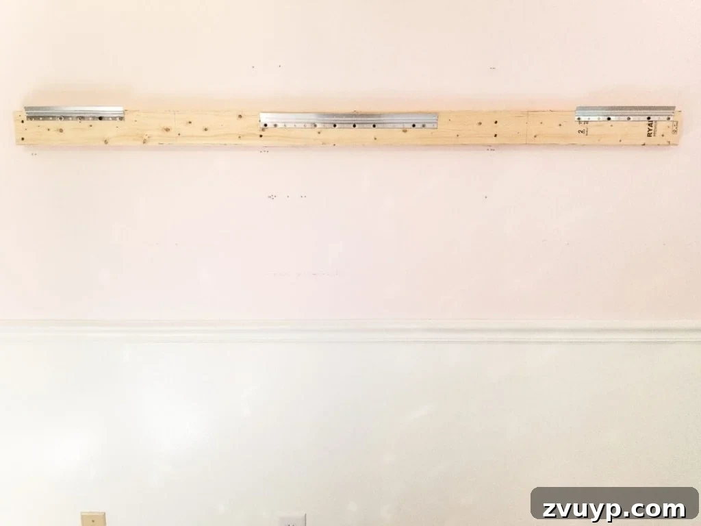 DIY Barre & Chair Rail Decor: Elevate Your Space and Practice 5 How to make a ballet barre with mirrors and shelf brackets and how to hang wall decor on a chair rail, board and batten, or molding #balletbarre #kidsdecor #girldecor #girlbedroom #girlroom #kidsroom #walldecor #hanginghack #wallhack #diywalldecor