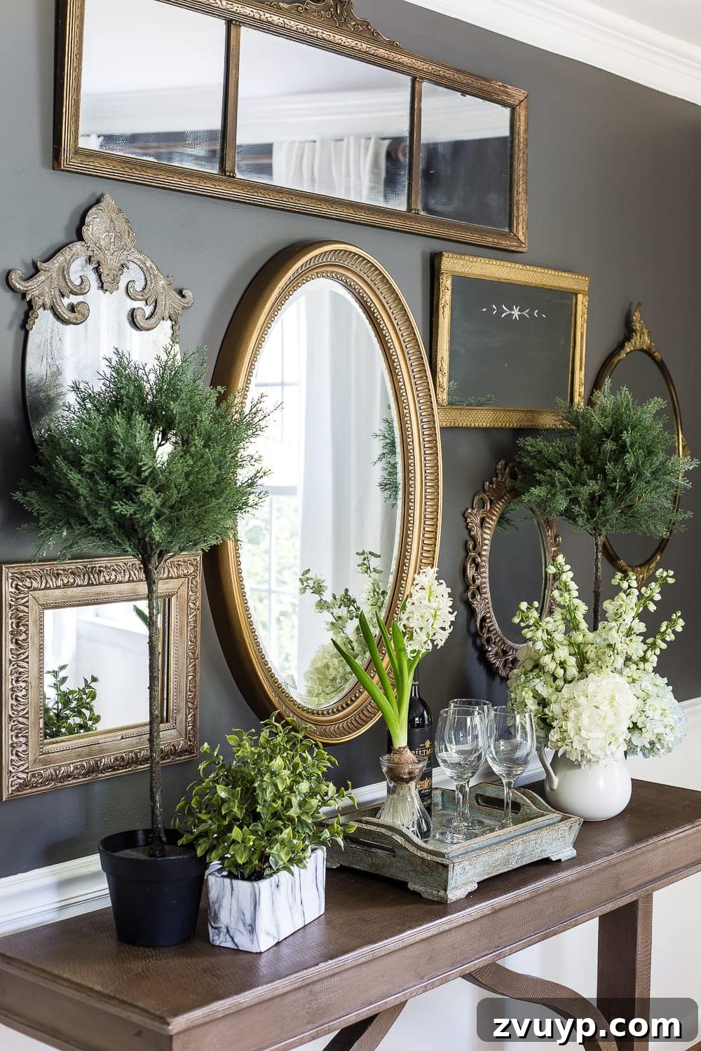 Inspiring Summer Homes 2018 15 Stunning antique mirror gallery wall in a dining room, showcasing a unique collection of vintage mirrors, adding character and light to a classic interior. #mirrorgallerywall #antiquemirrors #vintagedecor #DIYproject #diningroomart #colonialstyle