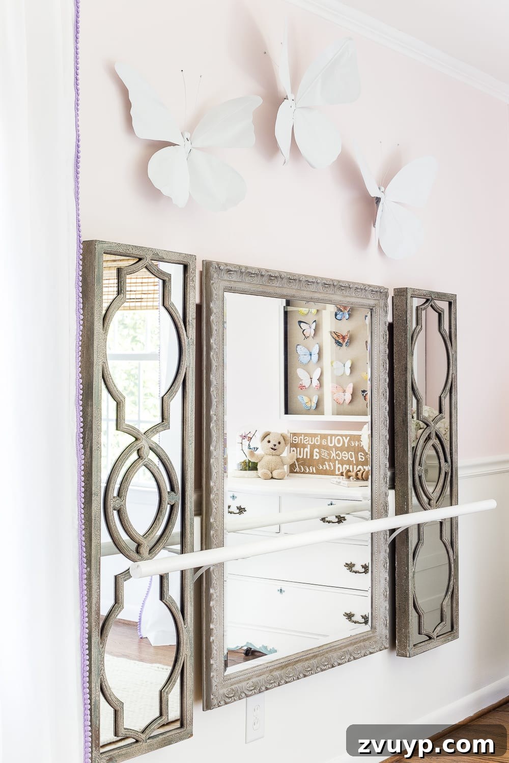 A little girl bedroom makeover with a butterfly theme full of thrifty makeovers, DIYable projects, and Anthropologie style knock-offs. #girlbedroom #littlegirlbedroom #girlroom #littlegirlroom #kidsspaces #kidsdecor #kidsroom #kidsdiy #bedroommakeover #kidsroommakeover #girlbedroommakeover