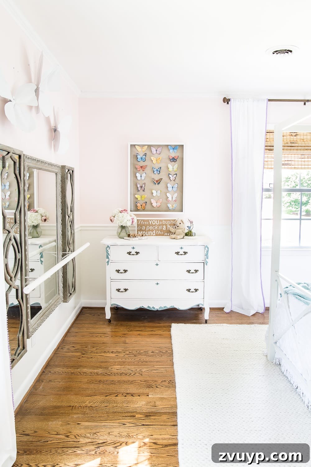 A little girl bedroom makeover with a butterfly theme full of thrifty makeovers, DIYable projects, and Anthropologie style knock-offs. #girlbedroom #littlegirlbedroom #girlroom #littlegirlroom #kidsspaces #kidsdecor #kidsroom #kidsdiy #bedroommakeover #kidsroommakeover #girlbedroommakeover