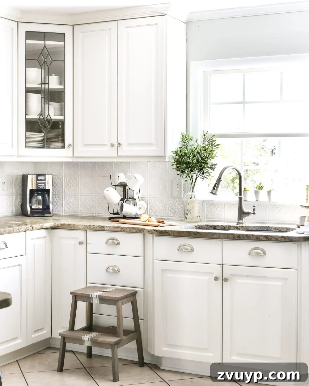 Fresh Green Kitchen Cabinet Ideas 3 A closer look at our temporary pressed tin backsplash in the kitchen, adding texture and character.