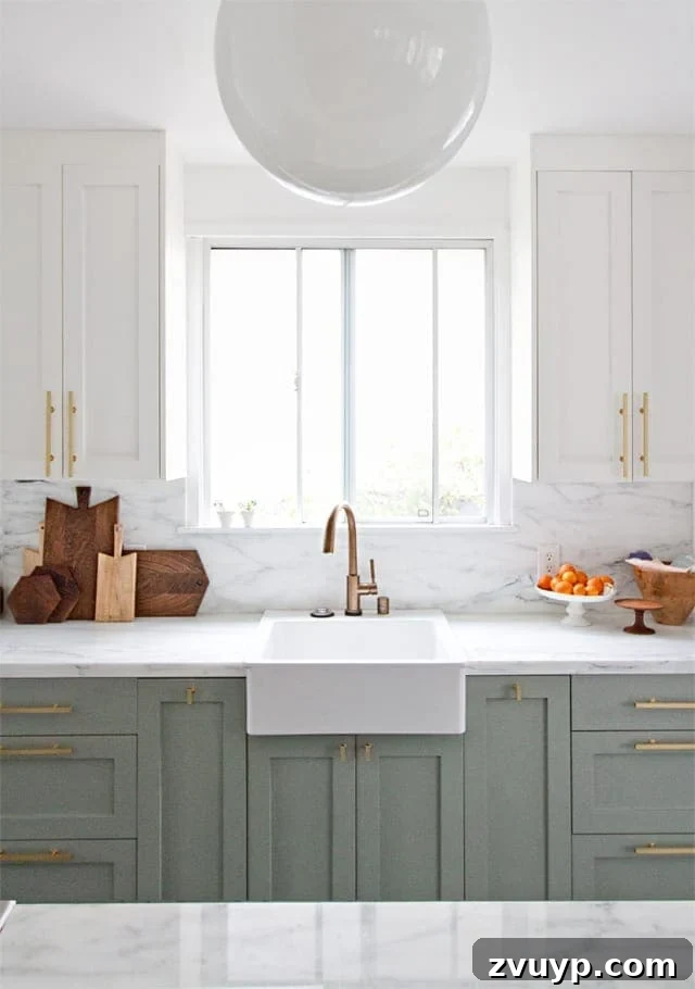 Fresh Green Kitchen Cabinet Ideas 7 Kitchen cabinets painted in Farrow and Ball Pigeon, a soft, muted blue-grey-green offering a serene and sophisticated look.